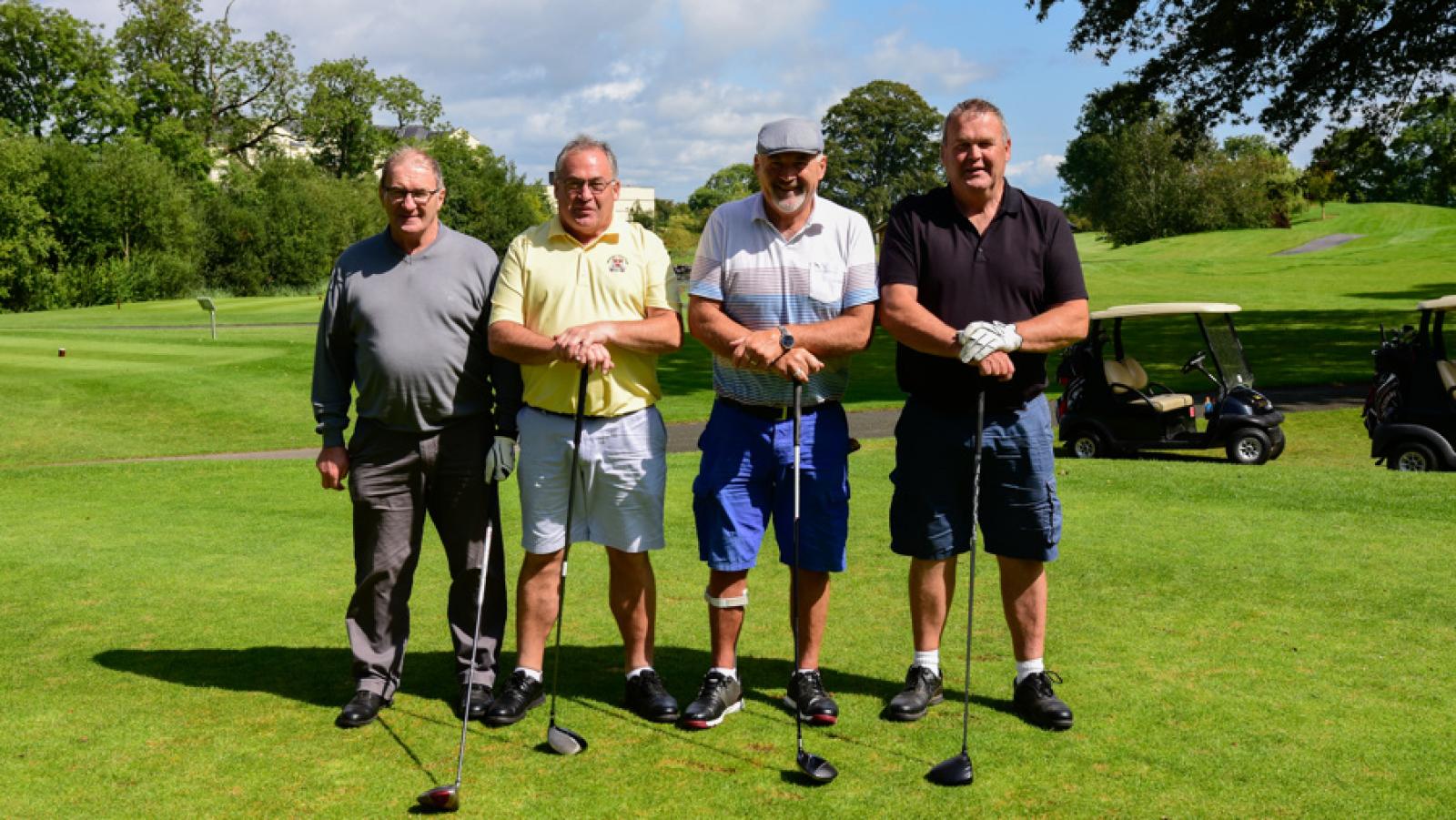 Four men pose during golf tournament organised for Special Olympics Ireland