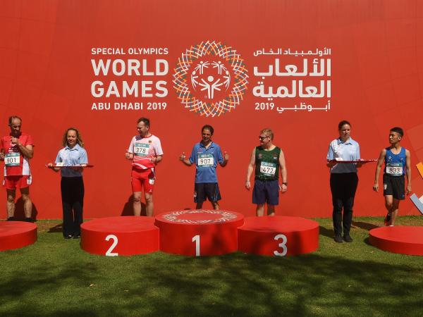 Athletes standing in front of presentation podium prior to medal presentation at World Games