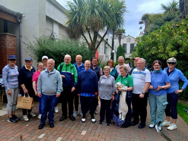 This image shows Sligo Fairways team smiling for a photo at Portmarnock Golf Event.