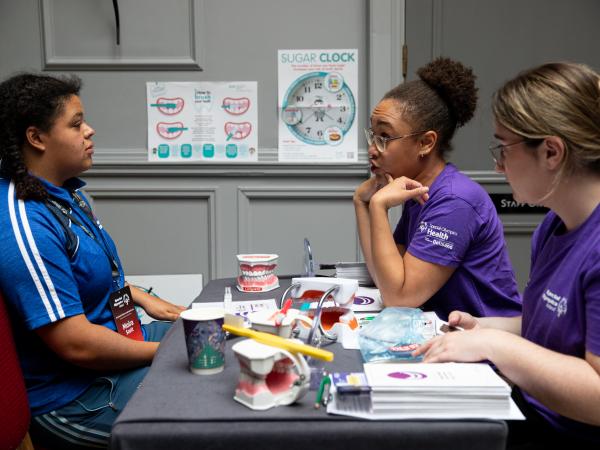 This image shows Moire Scott at Dental screening with UCC.
