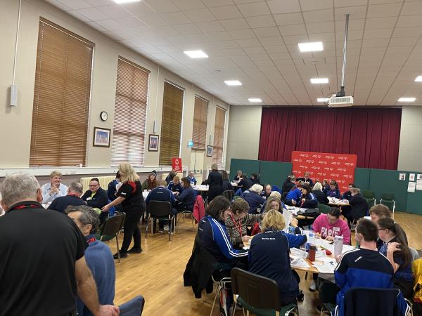 Athletes and mentors are pictured at the Ulster Athlete Leadership Forum 2025, taking part in a learning session about using A.I tool to generate ideas for mascots and songss