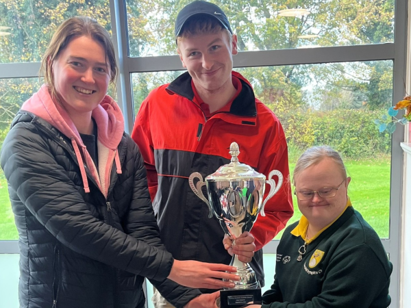 This image shows the captains of Blackrock Flyers and Elm Eagles Clubs sharing the Cup. Left to Right are Ciara Worrell, RDO Sport Eastern Region , Andrew Dunleavy of Blackrock Flyers, Alison Kelly of Elm Eagles