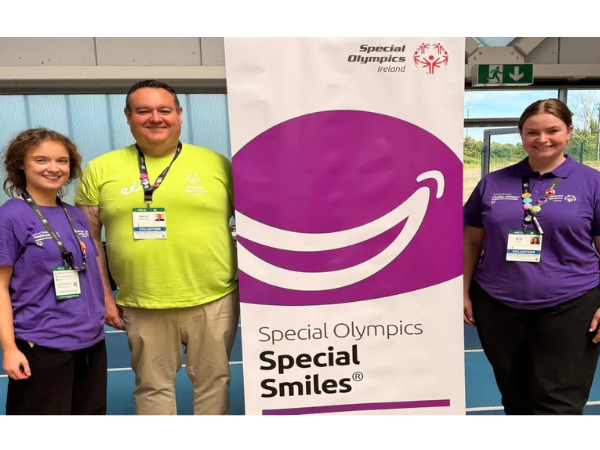 At Healthy Athletes Screening, ISG 2026 - Professor Gerry McKenna, Chair of Oral Health Services Research and Gerodontology at Queen’s University Belfast alongside fourth-year dental students from Queen's University, Dearbhaile Doherty and Erin Guinn.