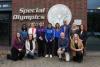 Group photo of Special Olympics Ireland staff, athletes, and representatives from the Golisano Foundation and Special Olympics international organisations standing outside the Special Olympics Ireland headquarters.