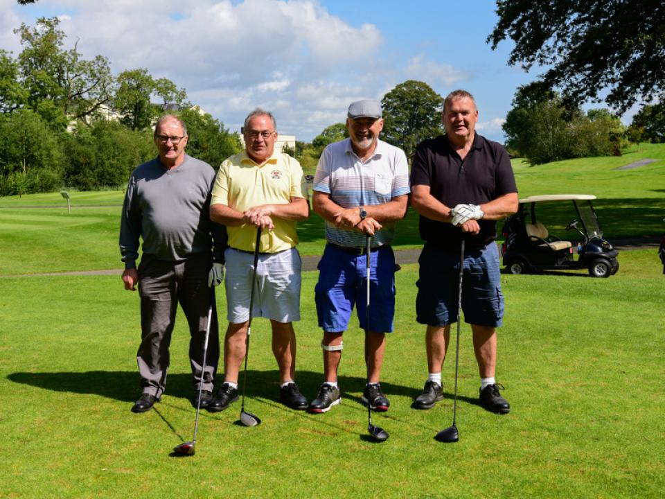 Four men pose during golf tournament organised for Special Olympics Ireland