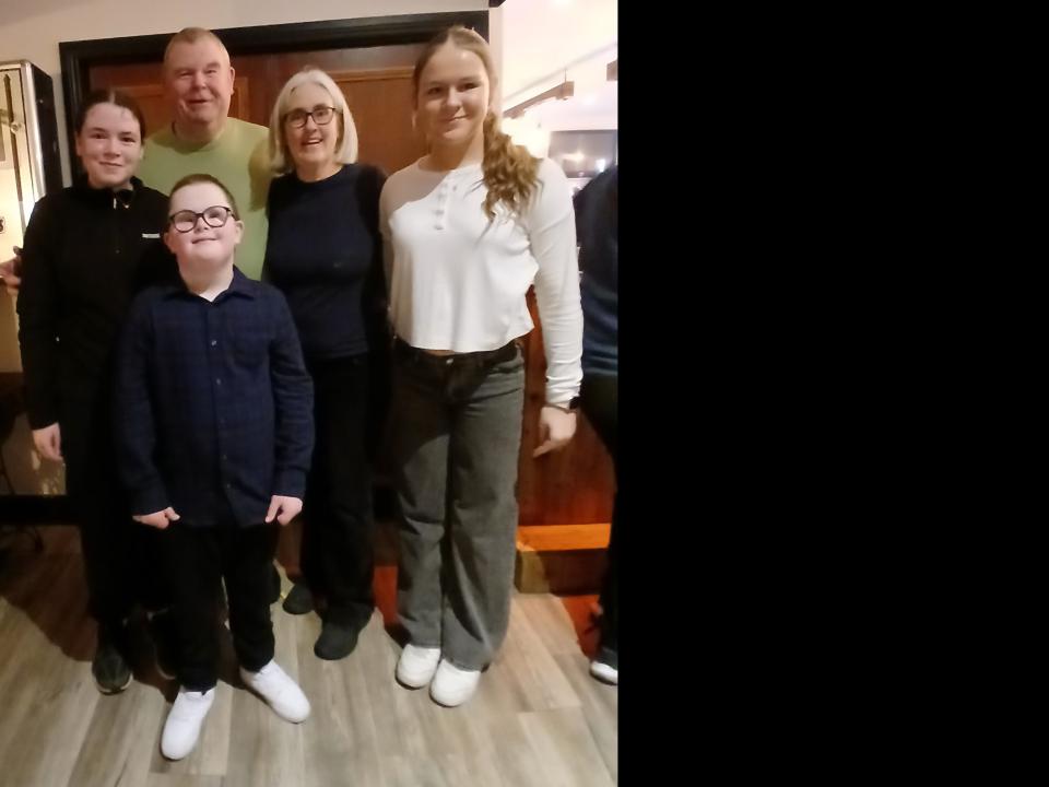 John with his mother Clare, Dad Shane, sisters Mary and Sinead