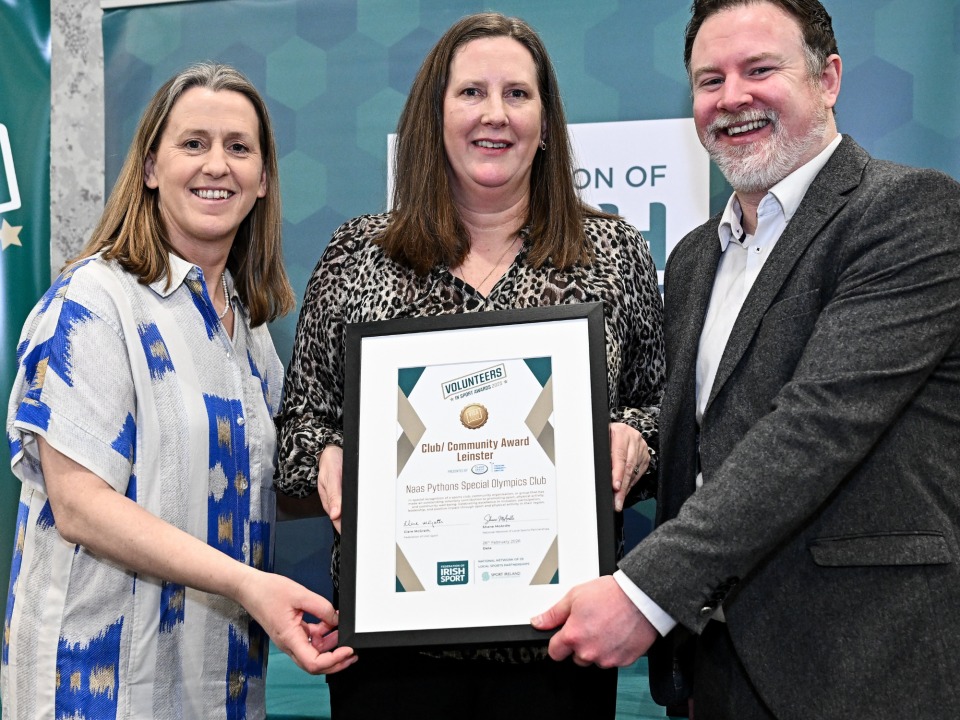 Chairperson of Naas Pythons SOC Suzanne Whelan collecting the Clann Credo Community Loan Finance Provincial Club Award for Leinster on behalf of the club, at the Federation of Irish Sport Volunteers in Sport Awards 2026