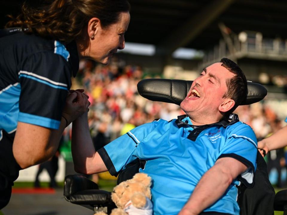 MATP athlete and Face of the Special Olympics Ireland Summer Games 2026 Francis Donnelly with support worker at the Opening Ceremony of the Ireland Summer Games in Tallaght Stadium on 18th June 2026