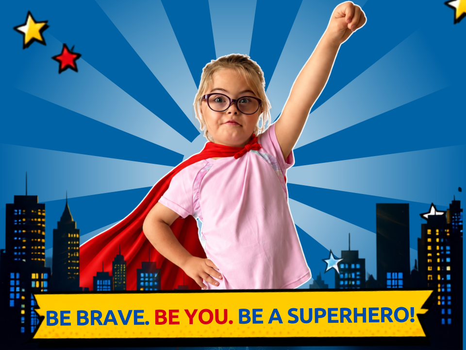 Special Olympics Ireland Superhero Day 2026 banner featuring a young girl dressed as a superhero against a blue comic book background.