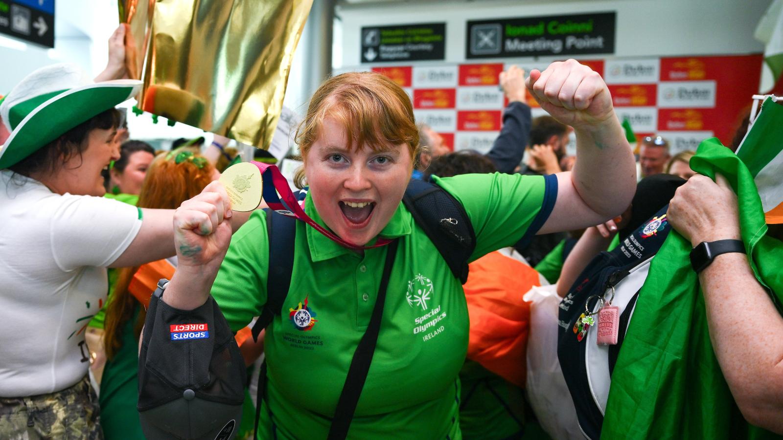 Anita Forde celebrates with medal