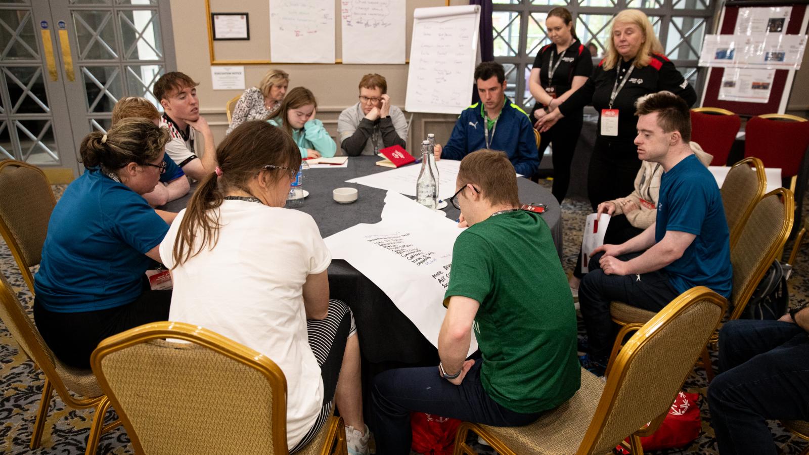 Athletes contribute to a discussion workshop at the 2024 All Ireland Athlete Leadership Forum.jpg