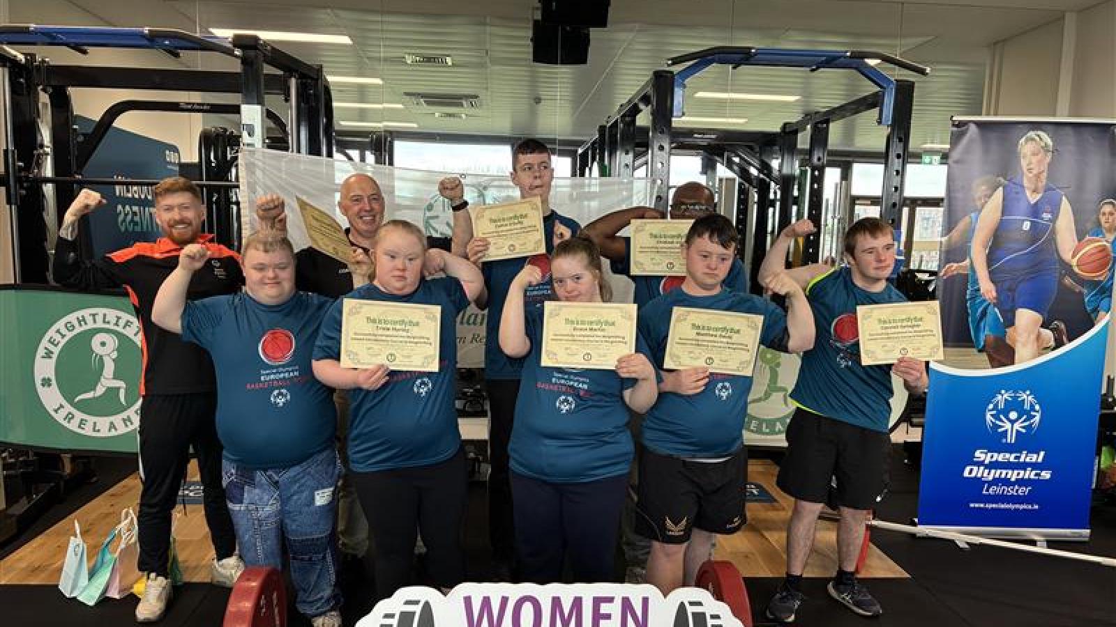 Full team photo with certificates - weight lifting programme